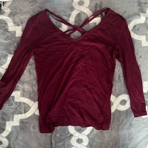 Purple reddish top. Top is very cute.